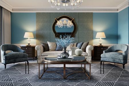 Living room interior in classic Mediterranean style with a beige sofa and two blue armchairs and blue walls