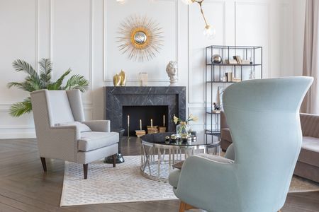 Modern luxury stylish apartment interior in pastel colors. a very bright room with huge windows filled with daylight