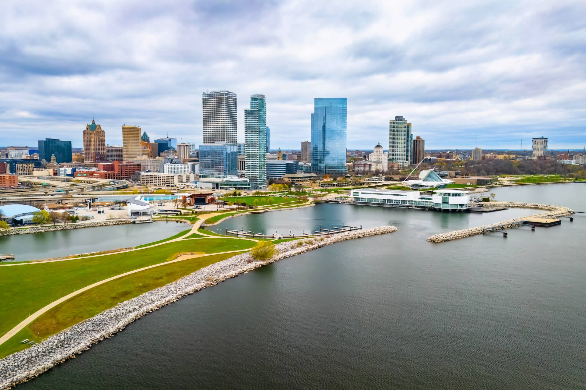 Milwaukee County, WI - Milwaukee Wisconsin city skyline with modern skyscrapers captured from Lakeshore State Park along Lake Michigan waterfront