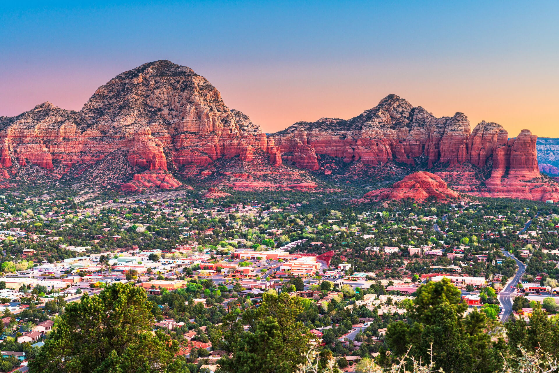 Sedona, Arizona, USA downtown cityscape and mountains