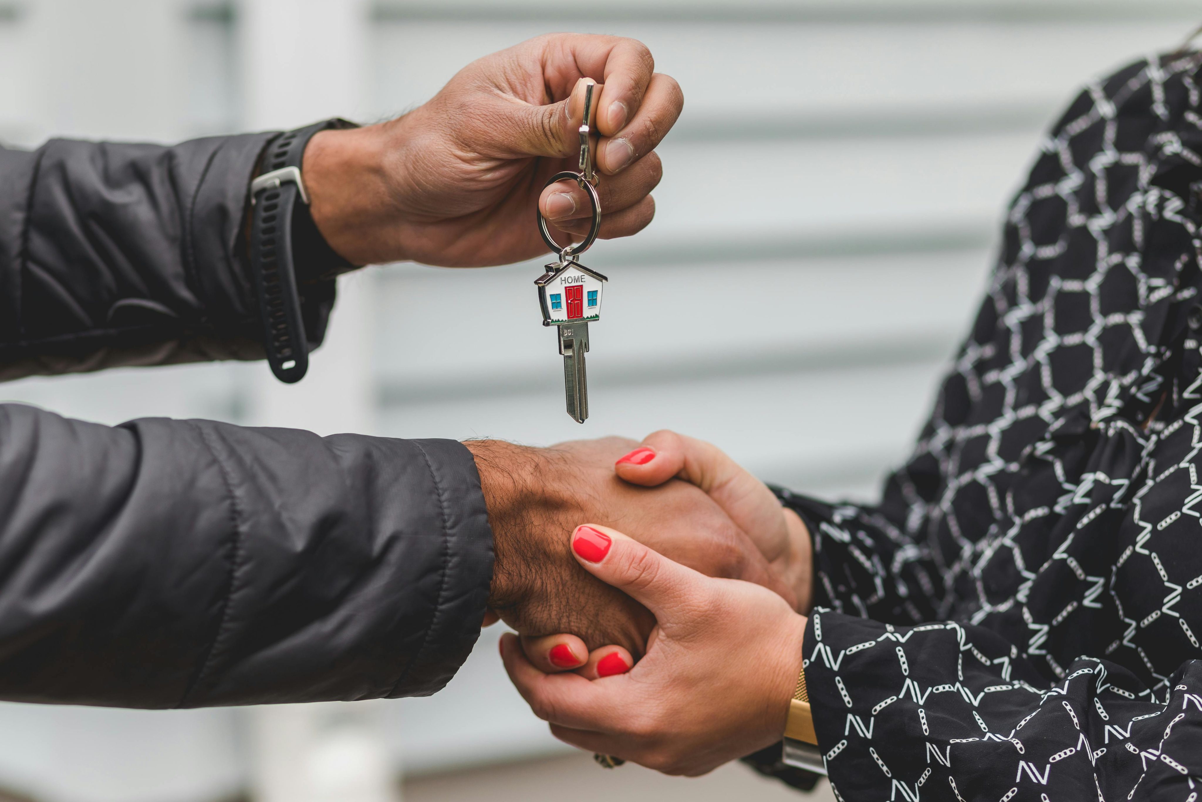 Handshake with house keys - divorce probate estate home sales