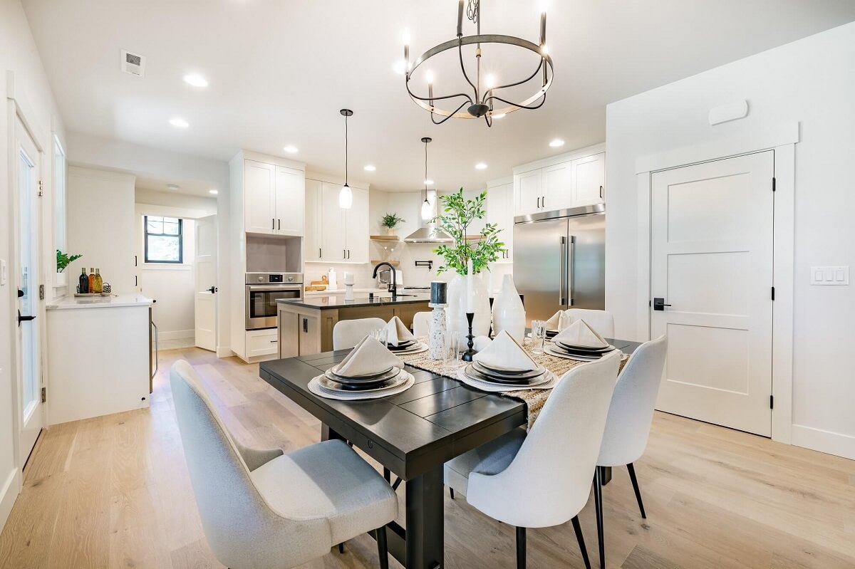 interior kitchen and dining room with high end appliances table small