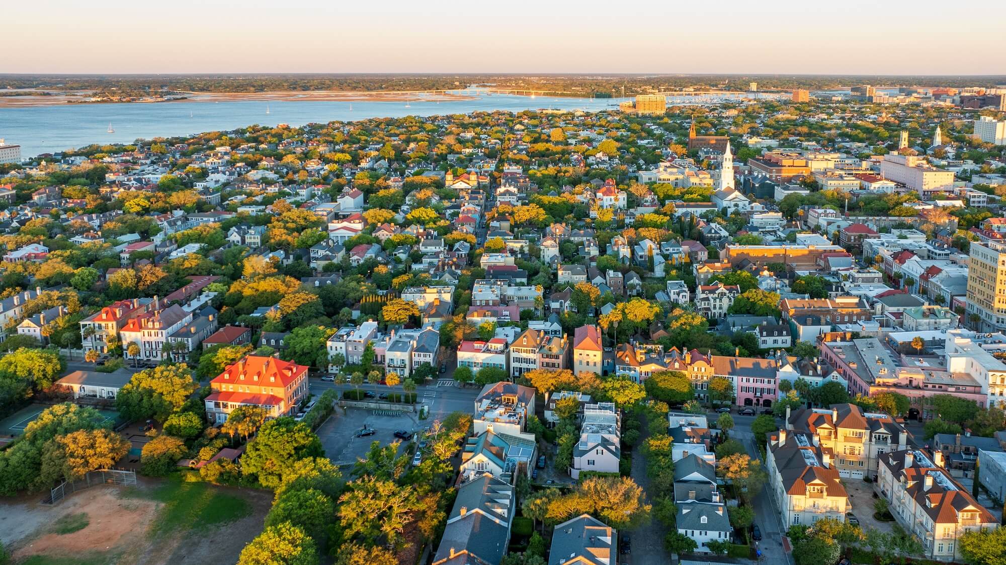 Golden sunrise light bathes downtown Charleston, South Carolina