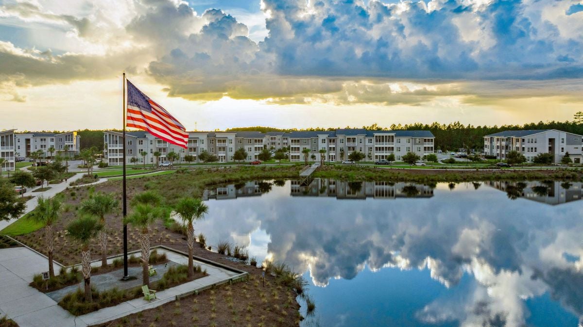 18-web-or-mls-Wildlight - Pioneer Park lake sunset flag