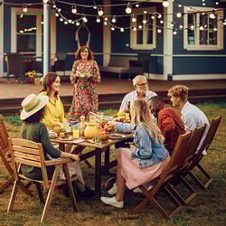 People-Cooking-Meat-on-a-Fire-Grill