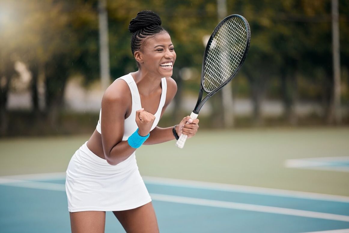 happy player or athlete on the court