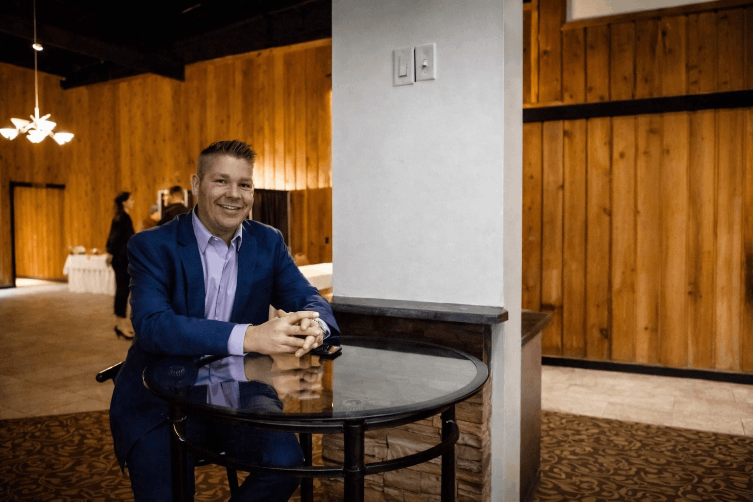 smiling man indoor setting