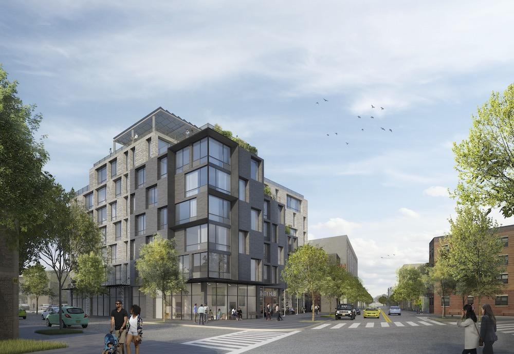 Row house streetscape with new infill development in Brownsville