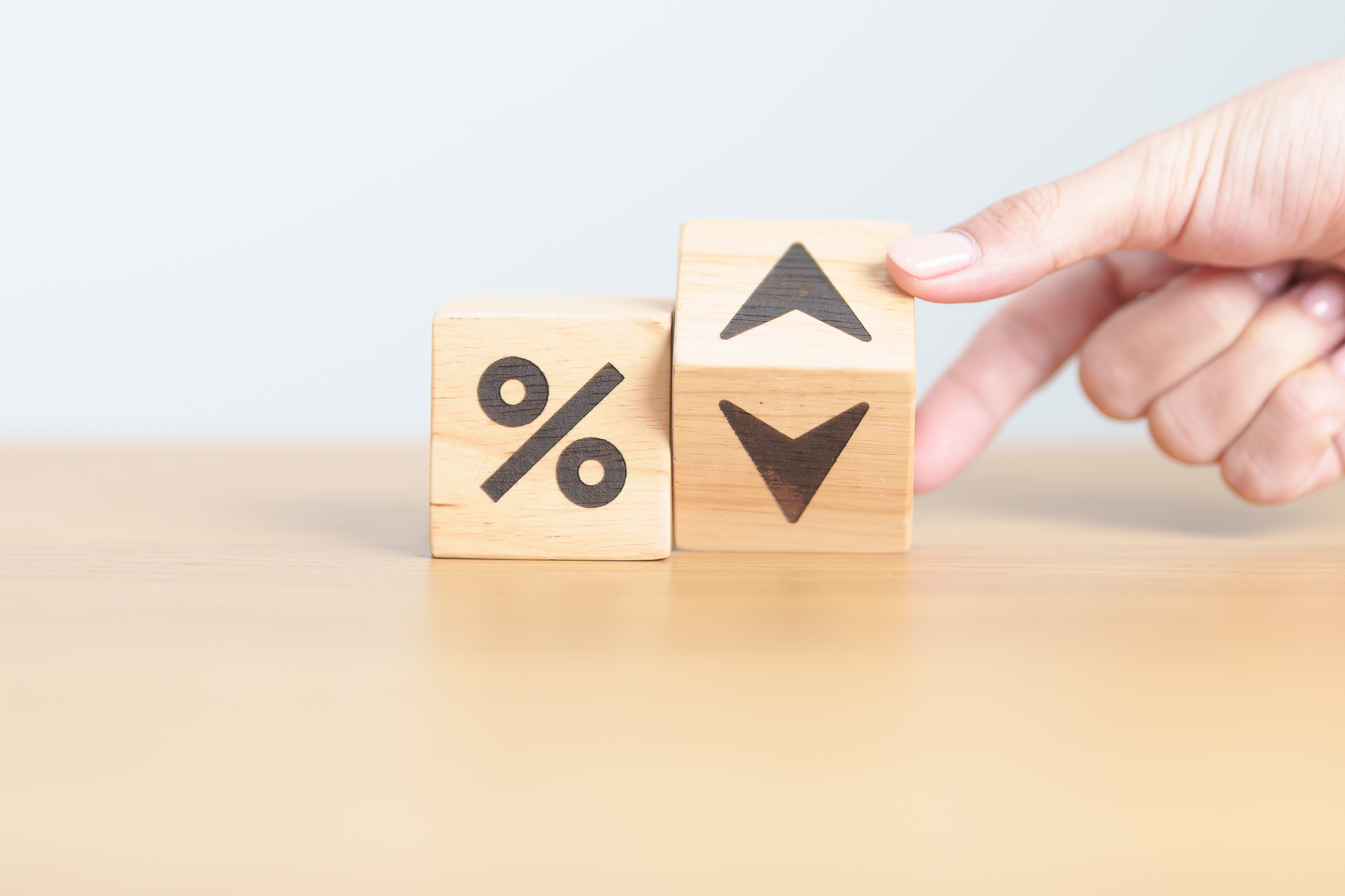 Wood,Block,Of,Percentage,Change,To,Up,And,Down,Arrow.