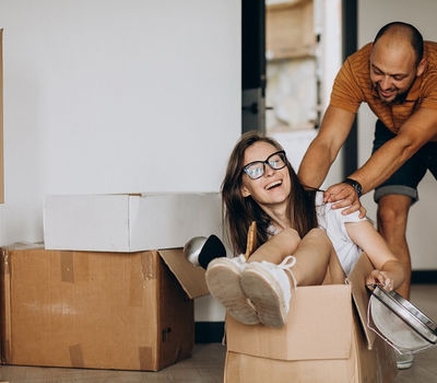 Young family moving into their new house