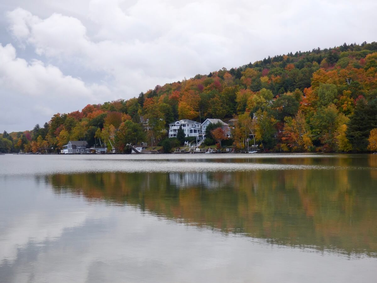 An autumn foliage view of Lake Sunapee Harbor, in New Hampshire.