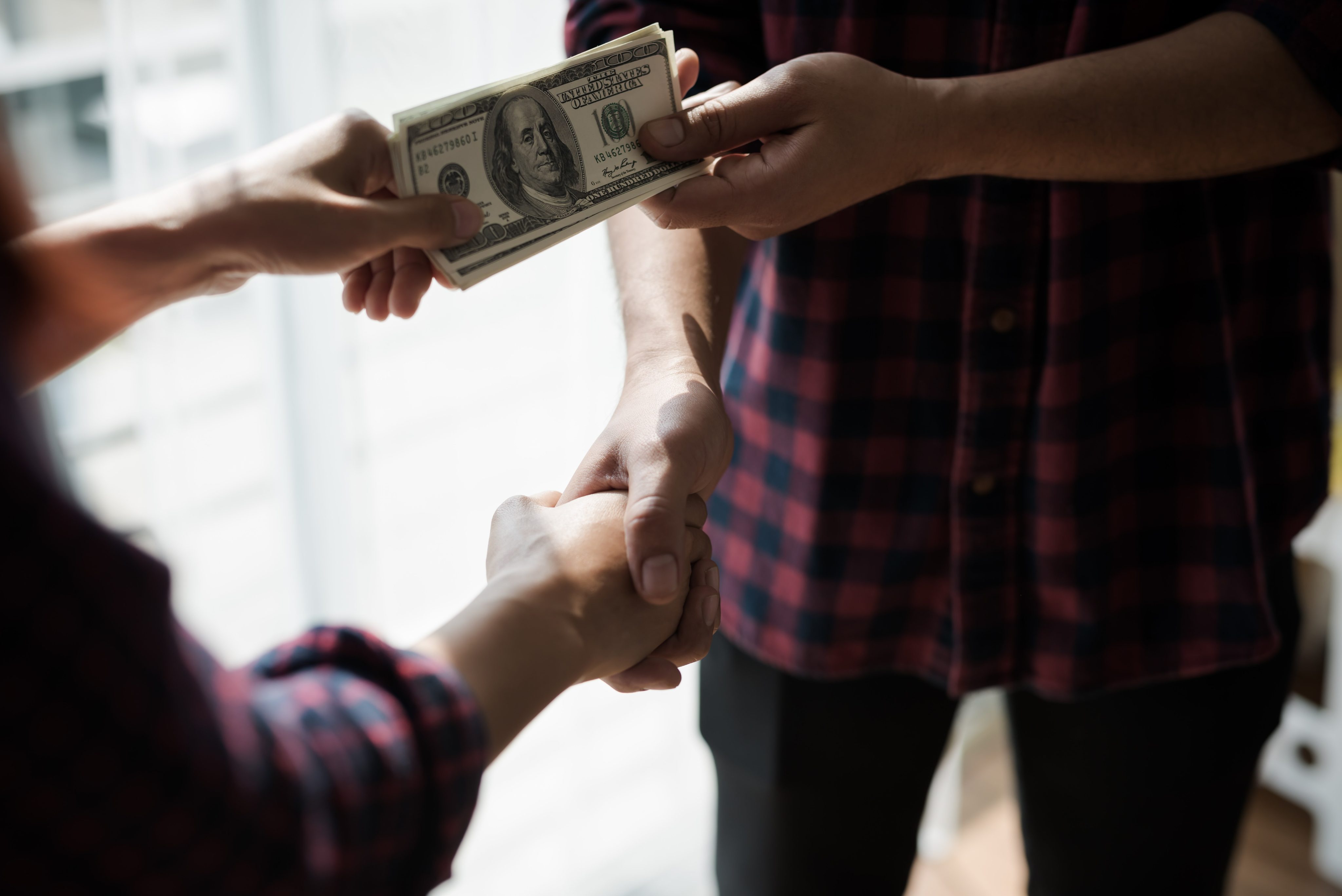 business-exchange-and-handshake-in-modern-setting-2026-03-26-08-34-37-utc