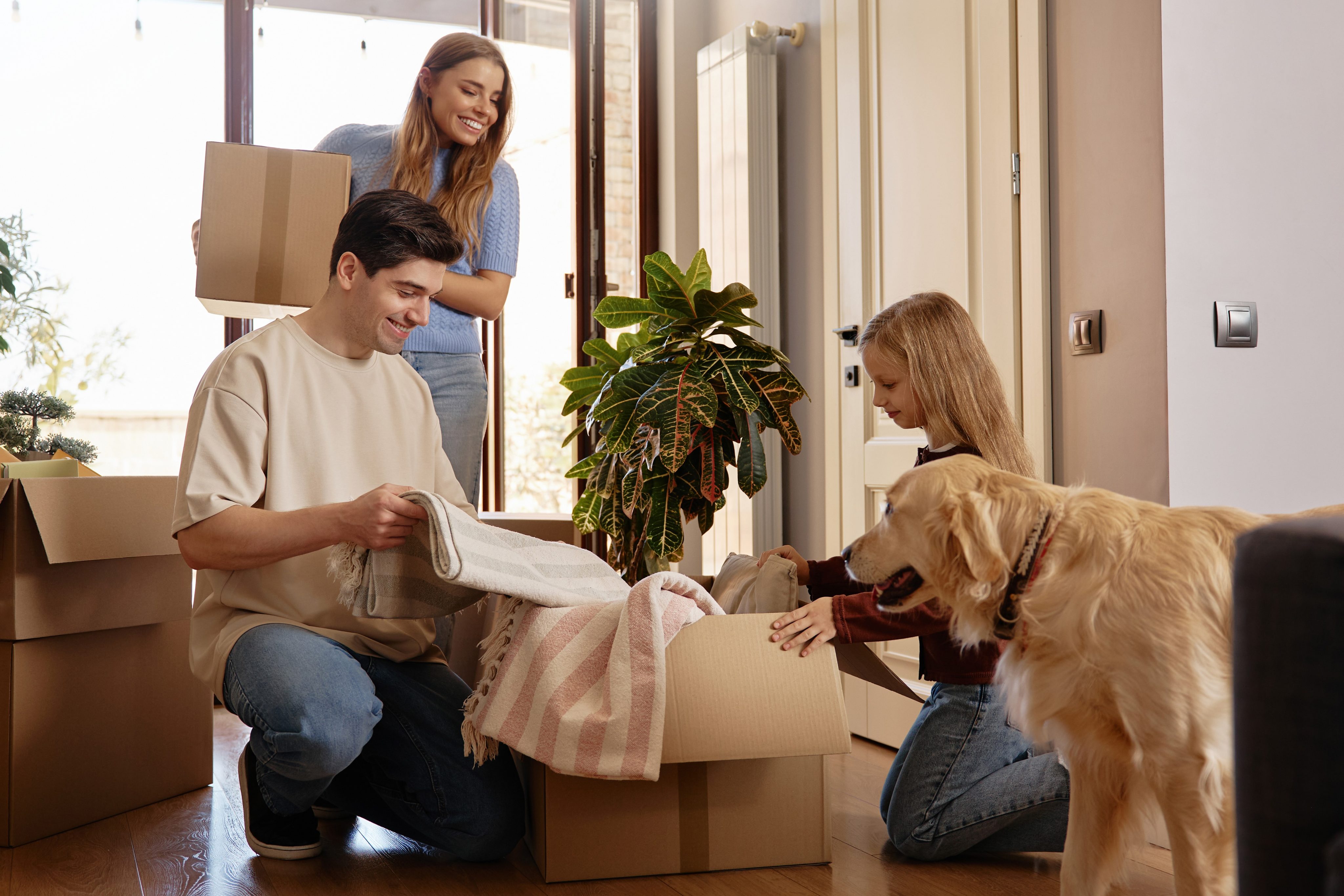 family-packing-belongings-into-boxes-at-home-2026-03-27-01-35-53-utc