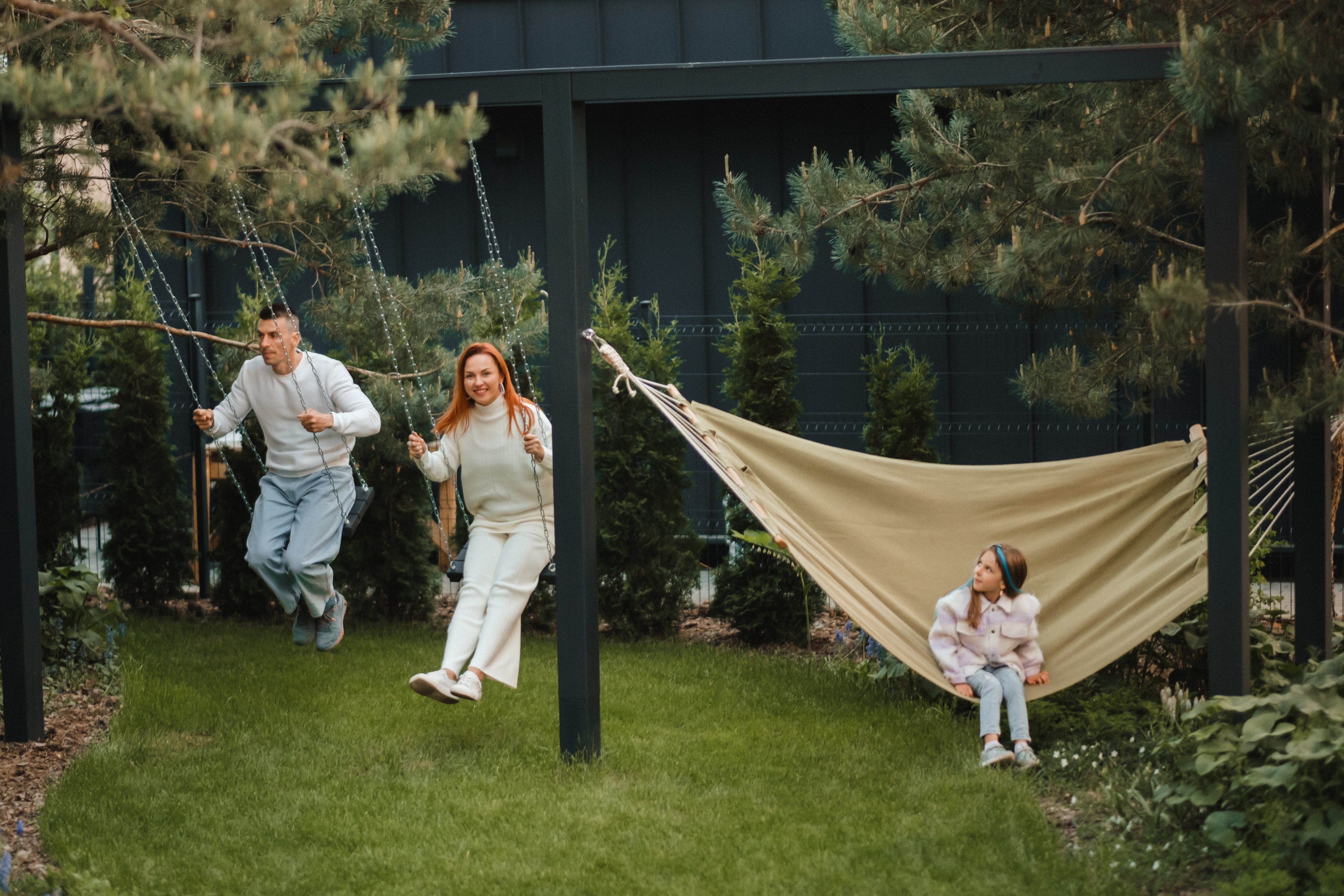 family-fun-in-suburban-garden-with-hammock-and-swi-2026-09-24-10-03-43-utc