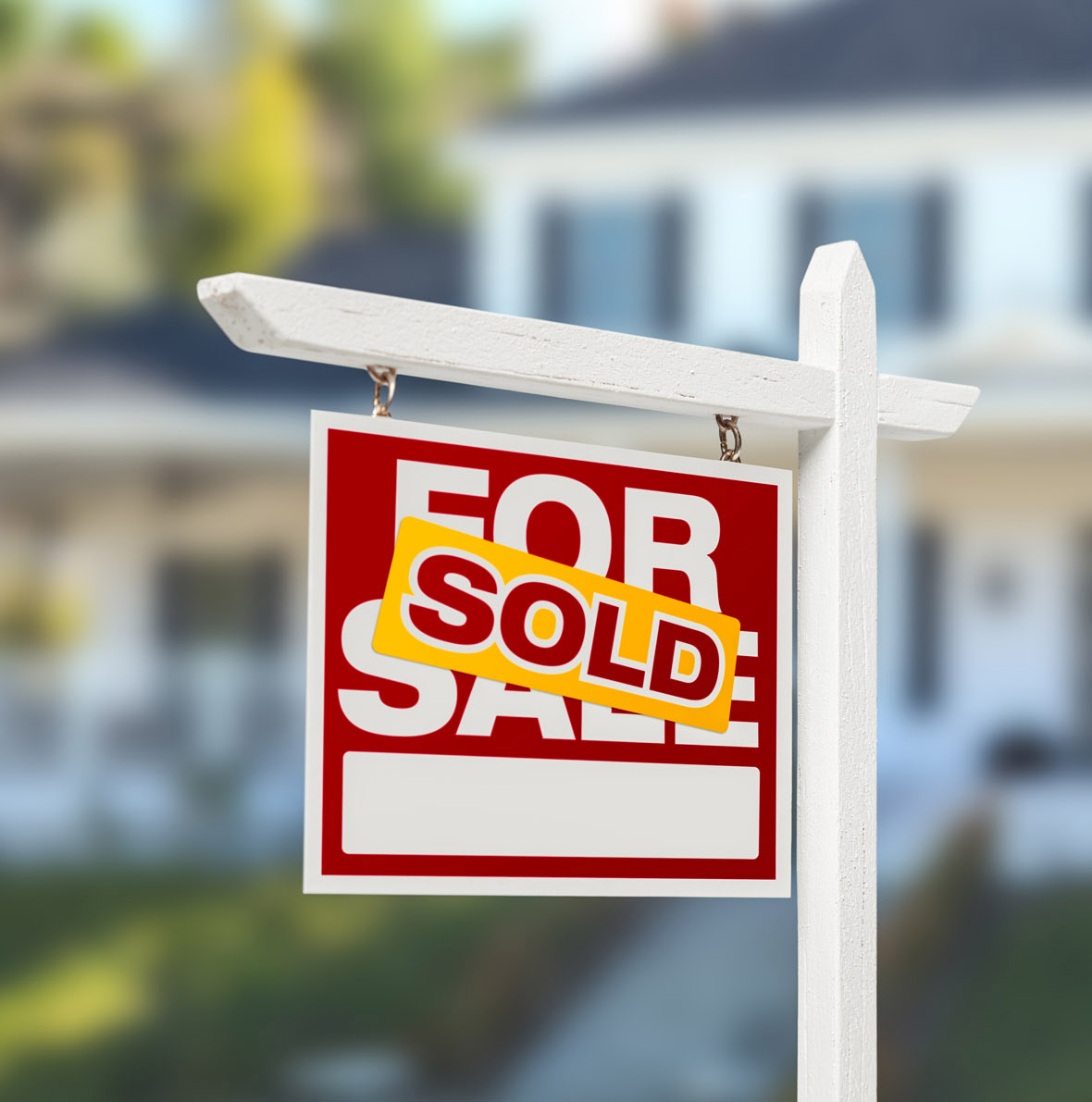 Sold,Home,For,Sale,Real,Estate,Sign,In,Front,Of