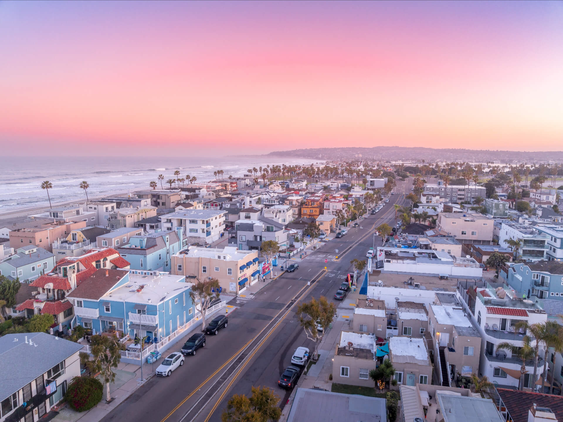 Mission Beach - Aerial view of colorful sunrise sky over Mission Beach San Diego