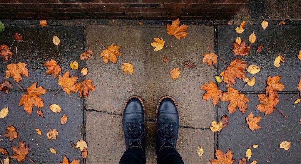 Boots stopped at a for sale sign on an autumn Kemptville sidewalk, representing the serious buyer season between September and October in Eastern Ontario.
