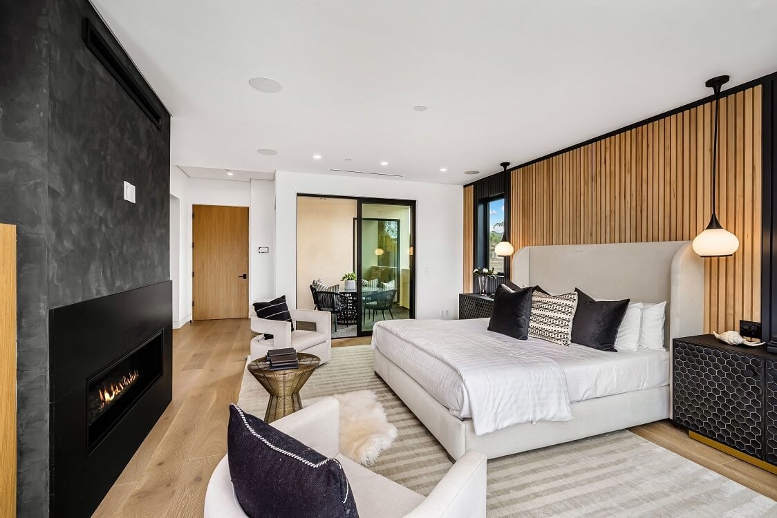 Modern bedroom with a cozy fireplace