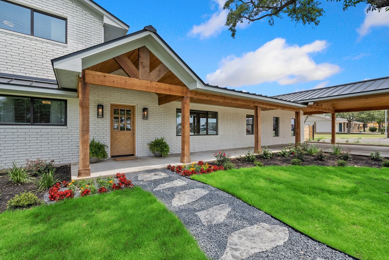 a home with a green lawn
