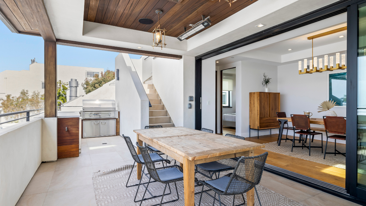 Indoor-outdoor dining and entertaining space at a South Bay home.