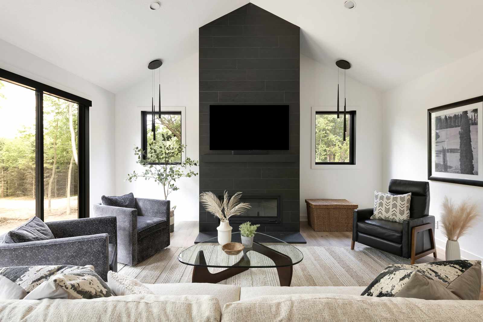 Interior-Impressions-Hastings-MN-Modern-Hilltop-Living-Room-Black-Shiplap-Fireplace-Black-Wood-Beam-Black-Framed-Windows-5-9f8906c6f48f48779222b39291716542
