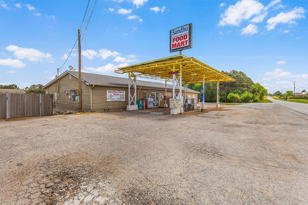 Gas station and convenience store for sale at 2550 Parks Mill Rd in Buckhead GA near Lake Oconee on a high-visibility corner lot