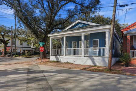 a_crisp_daytime_street_corner_neighborhood_scene_u