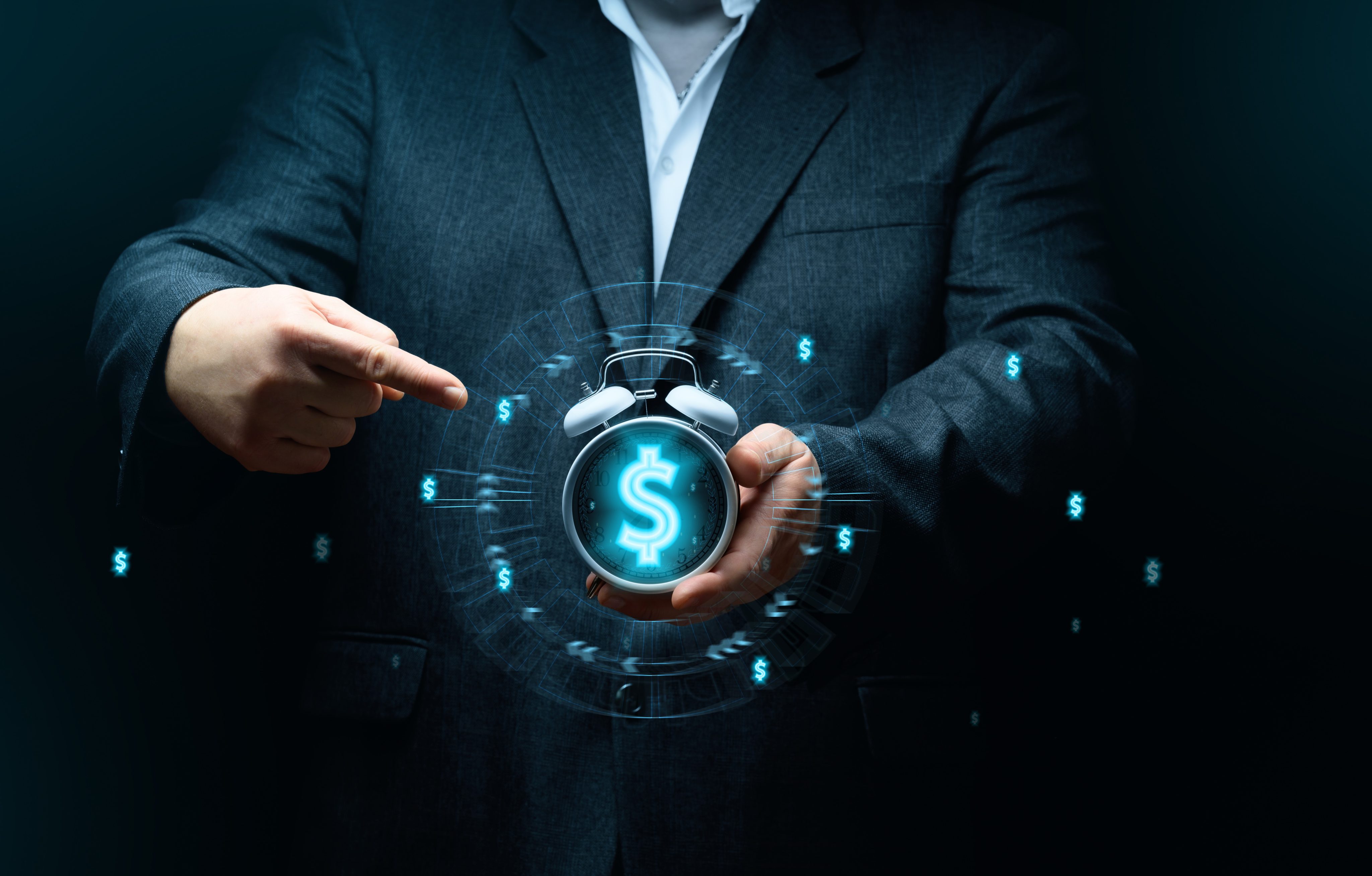 Businessman holding an alarm clock, the concept of time is money, the speed of decision making