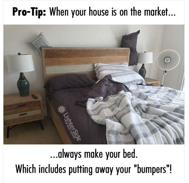 bed with pillows real estate agents