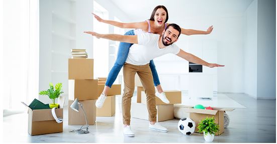 A happy couple smiling and enjoying each other's company.