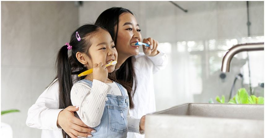 brushing teeth in a single bathroom home