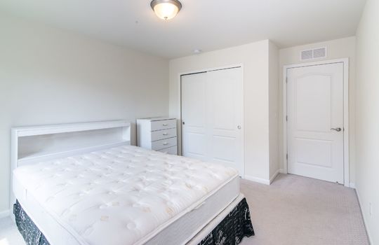 image shows a bedroom featuring several key elements