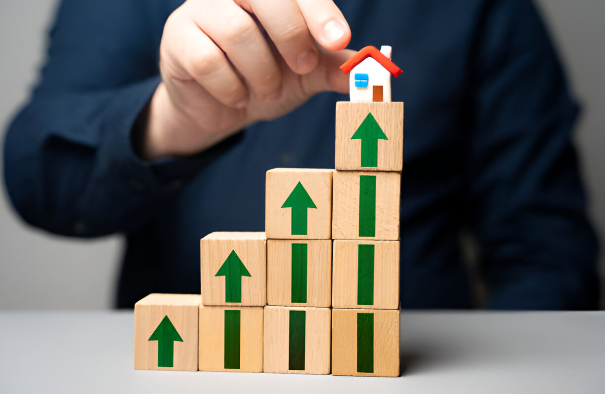 image depicts the concept of increasing real estate value or investment growth, often associated with property flipping or long-term appreciation