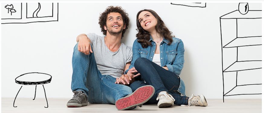 image shows a young couple sitting on the floor, leaning against a white wall, with simple line drawings of furniture around them