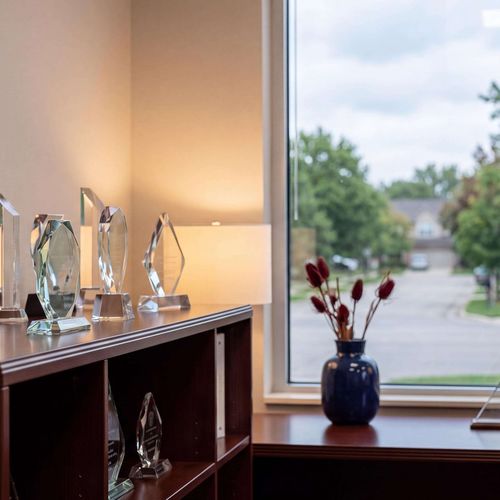 What Tom Gilliam's Awards Actually Mean: A Plain-English Guide to RE/MAX Hall of Fame, Platinum Club, and Professional Designations