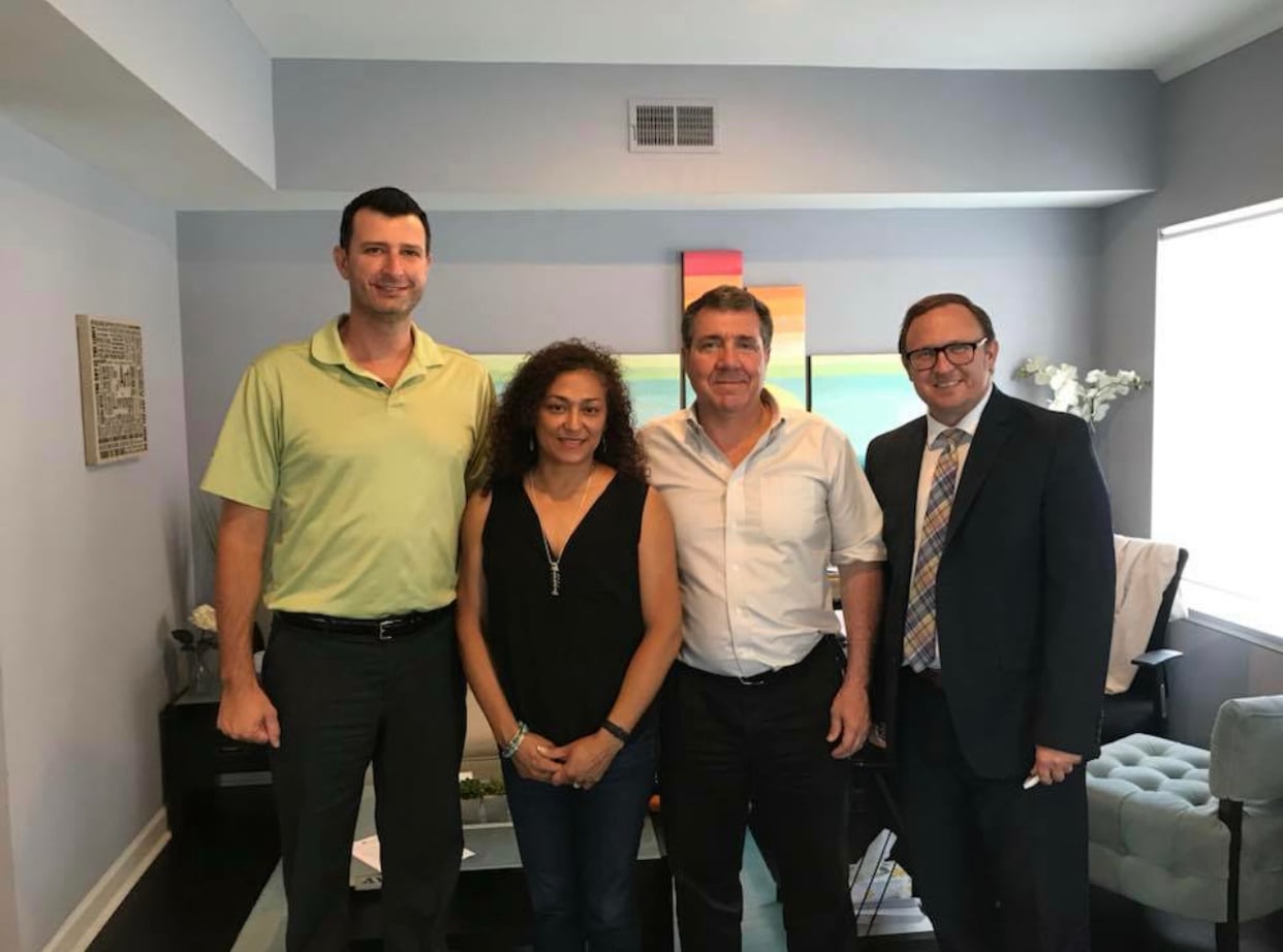 Anthony with clients 002