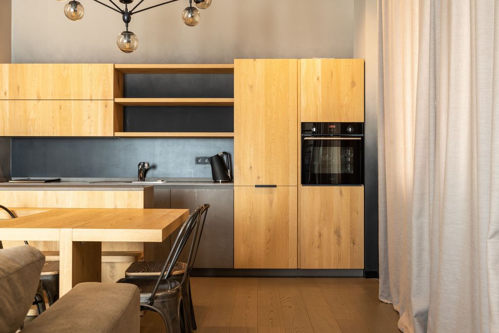 A bright, staged kitchen and dining area