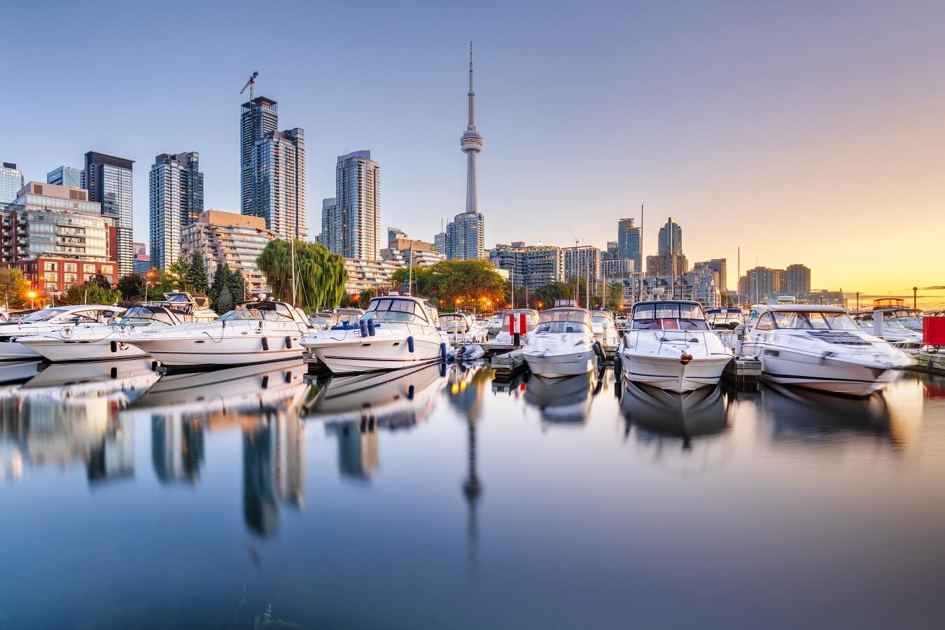Toronto, Canada city skyline with Harbourfront at dawn on Lake Ontario