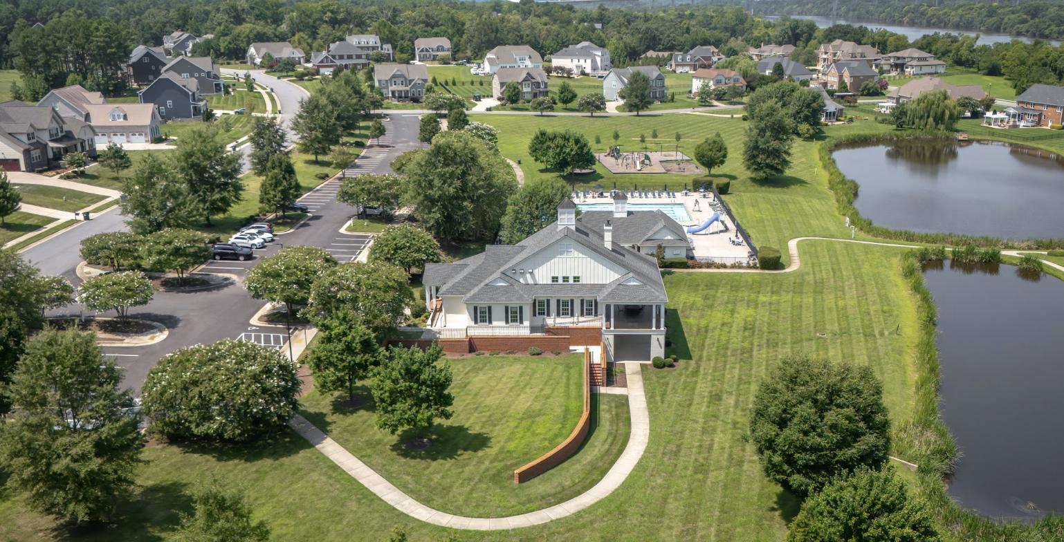 Chester neighborhood clubhouse and pool with the James River in the distance