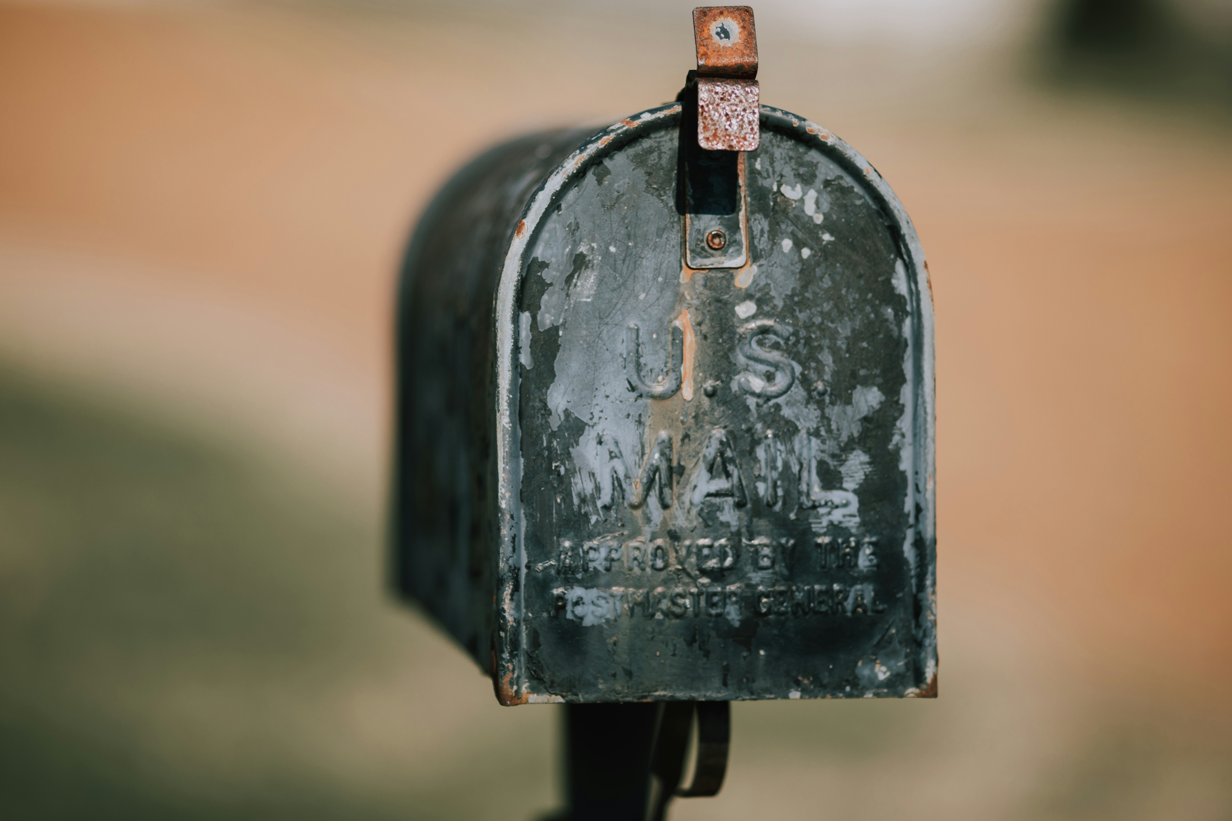 A close view of a black United States mailbox