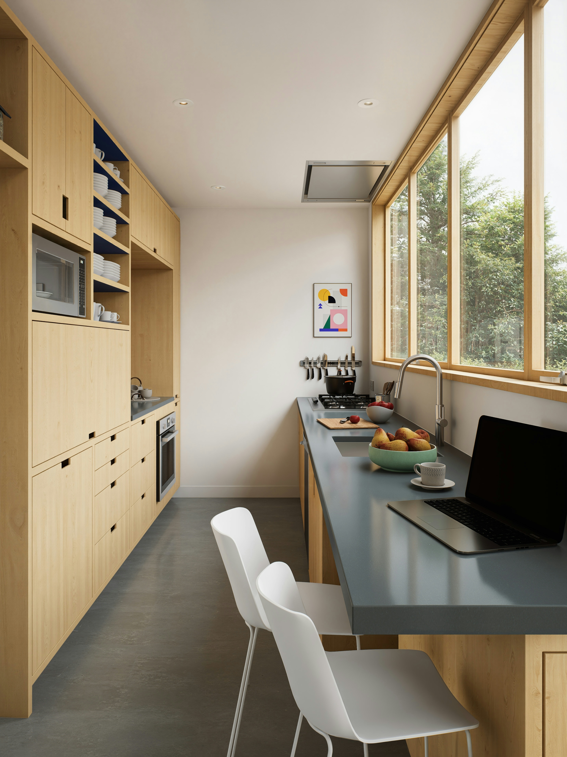 A galley kitchen with tall windows above the counter and open shelving on the end wall