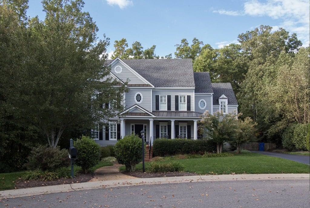 A brick-front colonial with a two-car garage in Twin Hickory, Glen Allen, Virginia