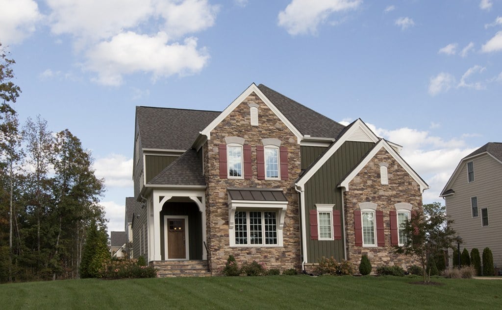 A two-story home with a stone front in Wyndham, Glen Allen, Virginia