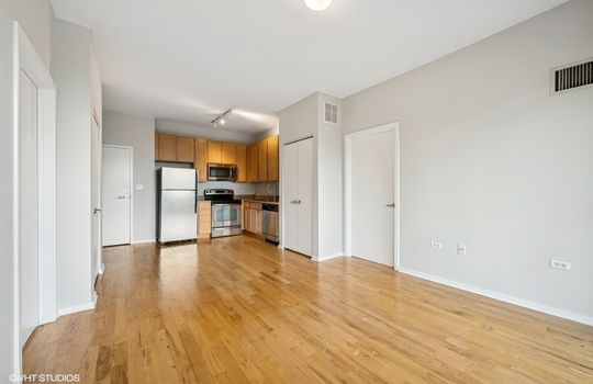 05_1E8thSt_606u_91002_KitchenLiving_Small