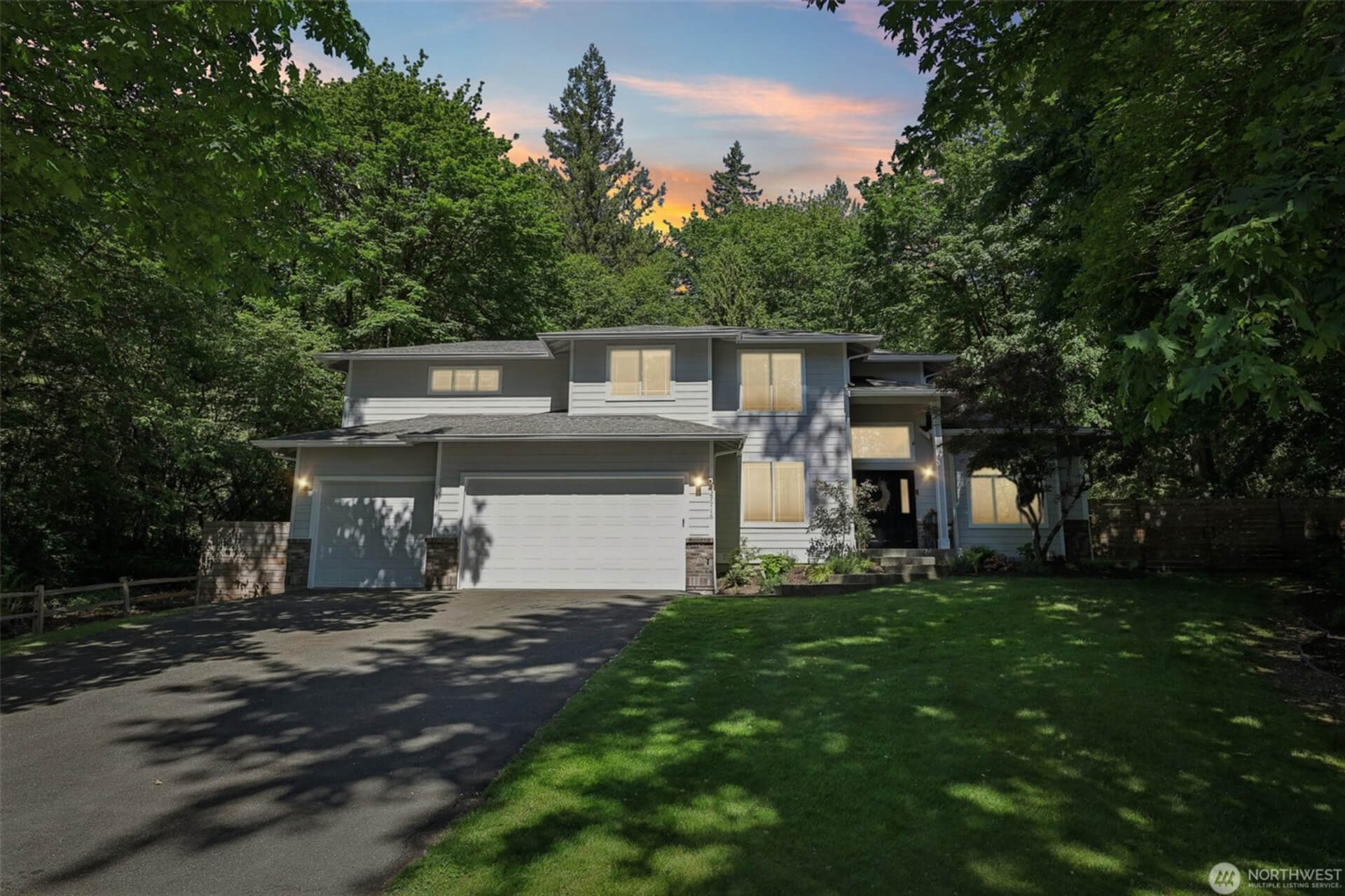 forest-surrounded suburban home