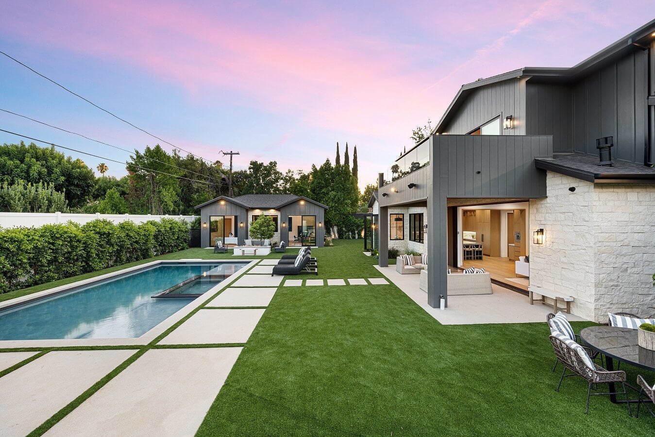 A modern backyard with a swimming pool