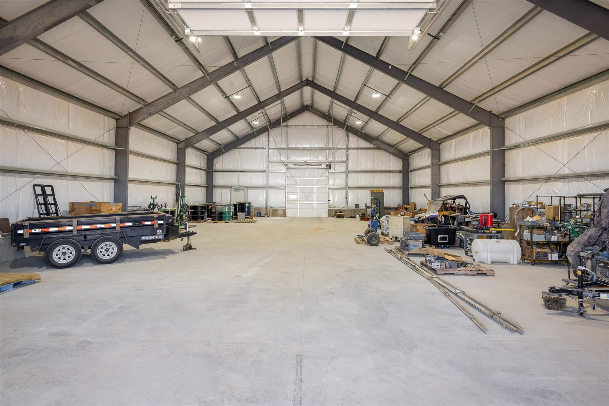 Interior of the large steel outbuilding after clean-out