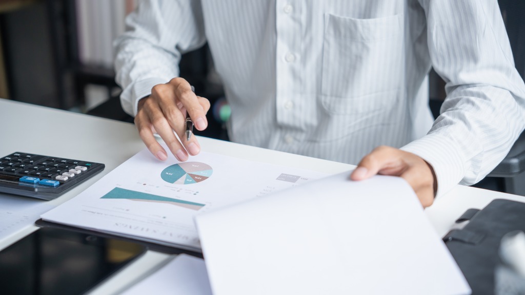 Business owner reviewing a buildout cost estimate