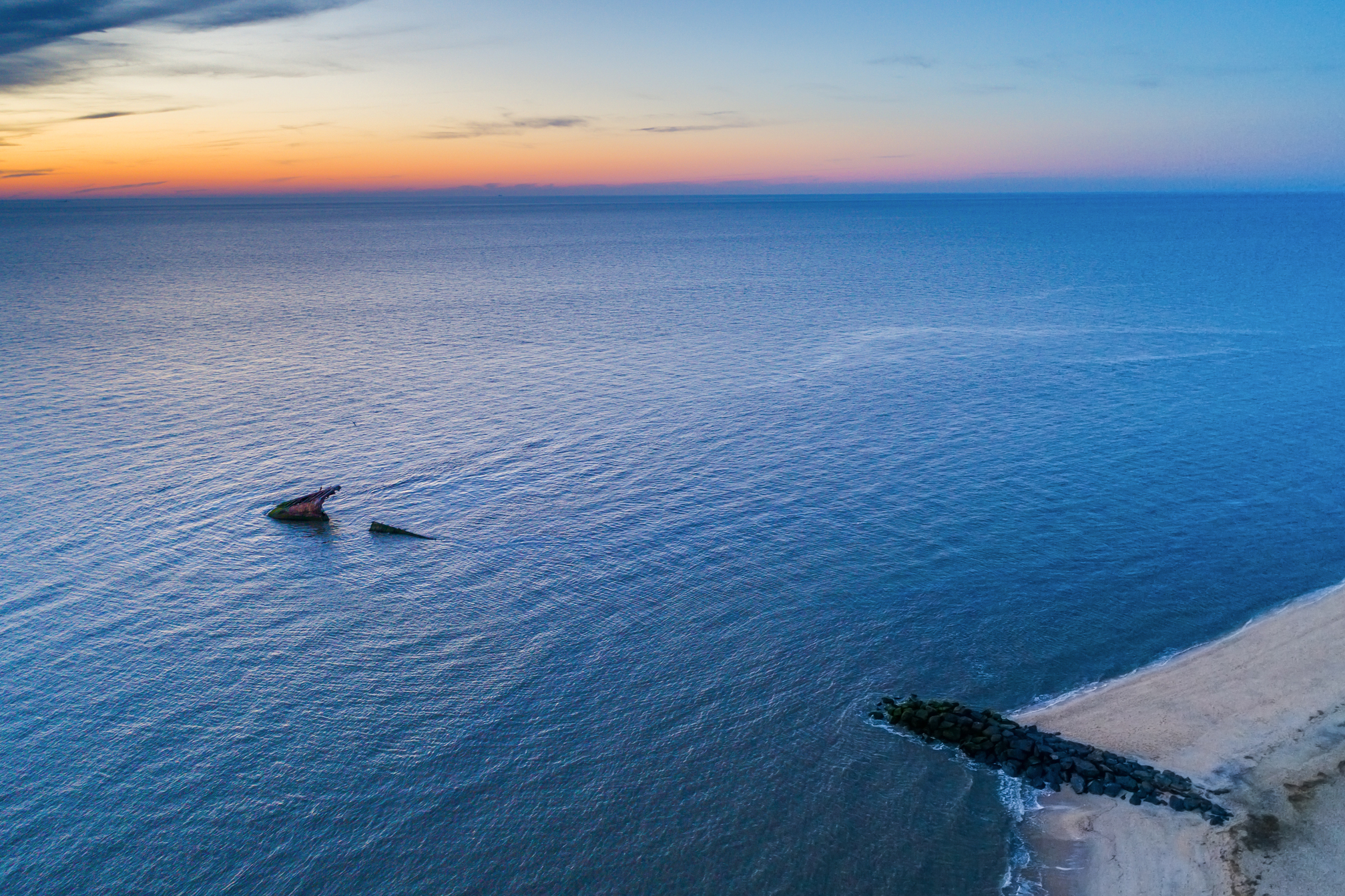 Sunset,Over,The,Delaware,Bay,And,Ss,Atlantus,Shipwreck,At