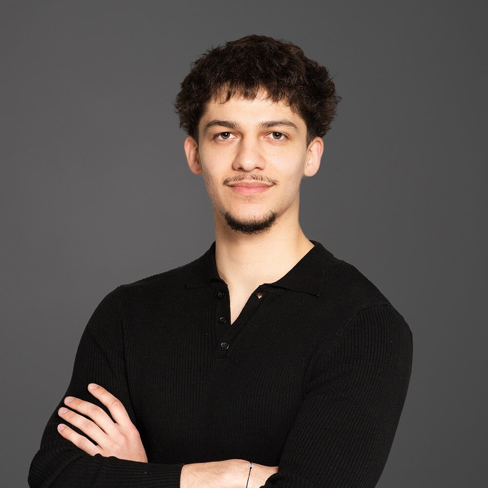 Marcus-Arms-Crossed-Higher (1)